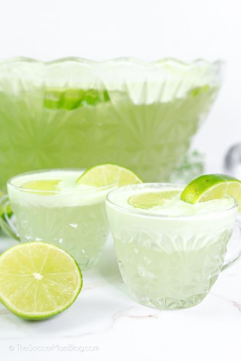 This fizzy lime sherbet punch has a vibrant green color that makes it perfect for St. Patrick's Day, Christmas, or any occasion worth celebrating! Lime Sherbet Punch, St Patricks Food, Green Cocktails, Easy Party Punch, Homemade Gummy Bears, Mojito Drink, Green Punch, Sherbet Punch, Day Cocktails