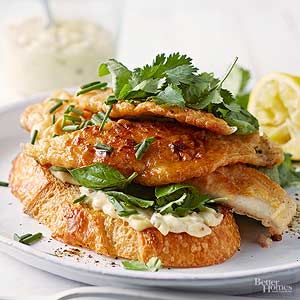 Flounder has a firm texture and a mild, sweet taste. Tilapia, grouper, or catfish would be equally delicious in this fish sandwich./ Flounder Sandwich, Buffalo Chicken Sandwiches, Breakfast Sandwich Recipes, Fish Sandwich, Seafood Salad, Homemade Breakfast, Salad Sandwich, Open Face, Homes And Gardens