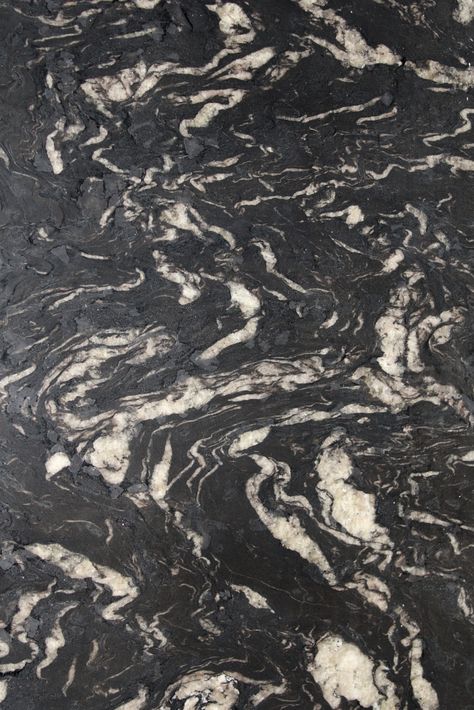 Exuding strength, mystery, and daring, titanium is a striking type of granite fit for the bold. Originating in Brazil, and also known as Cosmic Black, the black backdrop with swirls and waves of silver and gold make titanium an alluring and captivating material for any kitchen countertop, fireplace tiling, and bathroom flooring. // Thickness: 3cm / Finish: Leathered, Polished Titanium Granite, Masonite Doors, Types Of Granite, Led Display Screen, Black Backdrops, Black Granite, Seamless Textures, Kitchen Countertop, Black Stone