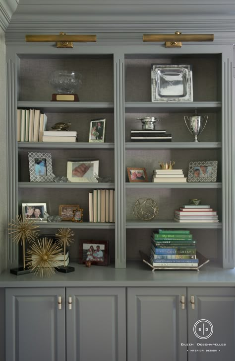 Library Book Shelf Lighting, Library Lights Over Bookcase, Bookcases With Lights, Library Lighting On Bookcase, Lights Over Bookshelves, Lights Over Bookcase, Bookshelf With Lighting, Brass Library Light, Grass Cloth Bookshelves