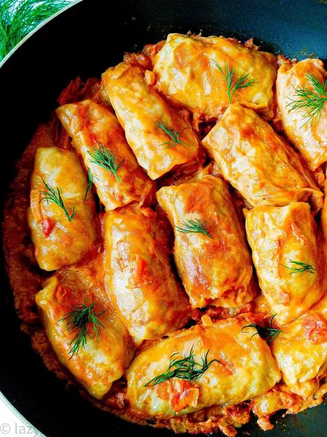 Russian Stuffed Cabbage Rolls (Golubtsi) | Foodtalk Golubtsi Recipe, Rice And Vegetables, Stuffed Cabbage Rolls, Fruit Popsicles, Cabbage Rolls Recipe, Stuffed Cabbage, Creamy Tomato Sauce, Cabbage Leaves, Fast Food Chains