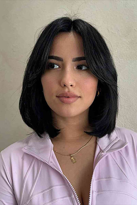 Sophisticated woman with a longer bob and middle-parted bangs Lived In Bob Haircuts, Bob Haircuts For Women With Thick Hair, Haircuts In Style, Short Bob With Front Layers, 90s Lob Fine Hair, Short Hairstyle Middle Part, Middle Bob Hairstyles, Straight Long Bob Hairstyles, Black Bob With Curtain Bangs