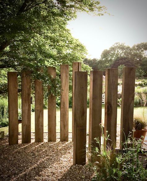 PROJECTS — GUY WOODHOUSE GARDENS LTD Wooden Garden Screening Ideas, Artistic Fence Ideas, Garden Divider Ideas Landscaping, Sleeper Fence, Natural Fencing, Garden Screening Ideas, Oak Fence, Privacy Screen Garden, Sleepers In Garden