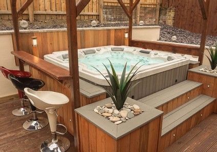 Hot Tub Wrap Around Bar, Under Porch Hot Tub Ideas, Hot Tub And Sauna Ideas Backyard, Hot Tub And Bar Ideas, Spa Pergola Ideas, Spa Surround Ideas, Hot Tub Steps Ideas, Pergola Over Hot Tub, Outdoor Spa Area Ideas