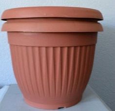 how to upcycle cheap flower pots, container gardening, crafts, gardening, via Kristin My Uncommon Slice of Suburbia Planter Makeover, Cheap Flower Pots, Pot Diy, Garden Globes, Plant Pot Diy, Planting Pots, Large Flower Pots, Diy Flower Pots, Diy Plant Stand