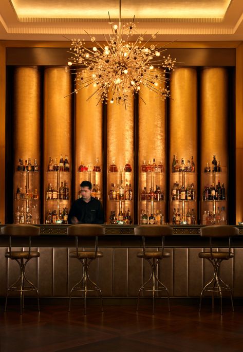 Nightclub Bar Design, Bar Interior Design Modern, Urchin Chandelier, Gold Bar Design, Bar Wall Design, Industrial Barstools, Gold Restaurant, Gold Interior Design, Starburst Chandelier