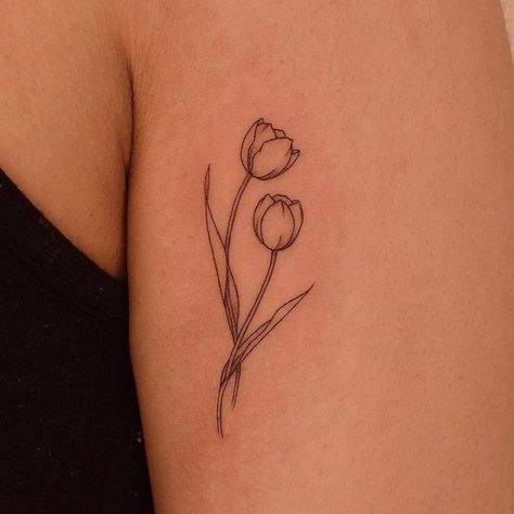 Fine line tulip tattoo on the upper arm Tulips Tattoo Design, Fine Line Tulip, Fine Line Tulip Tattoo, Tulip Tattoo, Petite Tattoos, My Tattoo, Classy Tattoos, Discreet Tattoos, Girly Tattoos