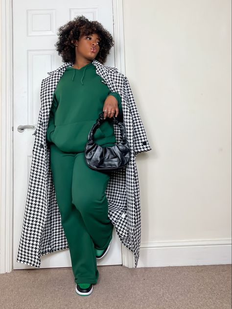 Green tracksuit outfit, black bag, houndstooth coat, trendy winter fits, green air Jordan 1s Plus Size Tracksuit Outfit, Green Tracksuit Outfit, Satin Two Piece Outfit, Trendy Winter Fits, Green Hoodie Outfit, Plus Size Asian Fashion, Green Tracksuit, Sweatsuit Outfits, Tracksuit Outfits