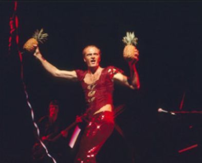 Peter Allen dancing with pineapples in concert c.1977.🍍 Peter Allen, Hawaiian Shirt, Pineapple, Dancing, Festival, Concert