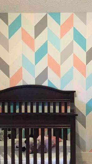 Oh, baby, do we love this peach and teal chevron pattern. Design a creative nursery for your baby with an amazing wall design, painters tape and your favorite paint colors. Nursery Wall Design, Wall Painting Creative, Painters Tape Design, Grey Striped Walls, Peach Rooms, Teal Nursery, Painting Creative, Striped Room, Interior Wallpaper