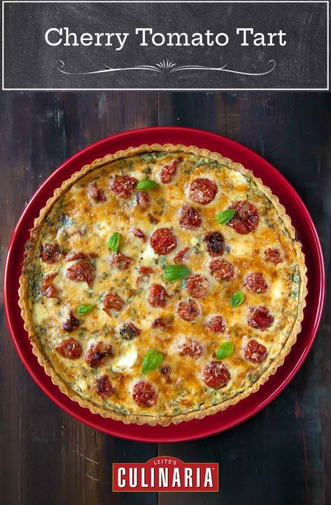 This cherry tomato tart calls for a homemade herbed crust, heavy cream, goat cheese, Parmigiano-Reggiano, and tons of tomatoes. We like to think of it as summer in a pie crust. #tomatoes #tart #pie #cheese Cherry Tomato Tart, Tomato Goat Cheese, Tomato Tart Recipe, Cherry Tomato Plant, Goat Cheese Tart, Cheese Tart, Tarts Crust, Tomato Tart, Cheese Tarts