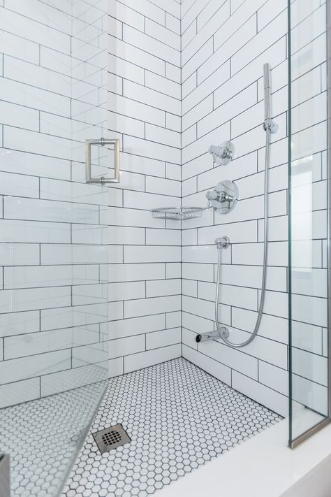 Classic white subway tiled shower with Soho 4x16 glossy tile. 1x1 hex tiled shower floor with contrasting grout. White Subway Tile Shower Ideas, Subway Tile Shower Ideas, Tile Shower Floor, White Subway Tile Shower, Tile Walk In Shower, Subway Tile Showers, Subway Tiles Bathroom, Shower Floor Tile, Tiled Shower