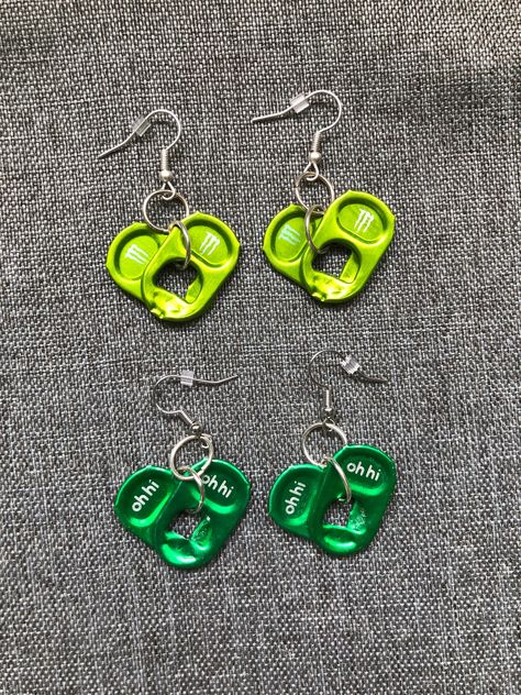 Earrings made from upcycled pop tabs and silver ear wire. Backing is made from upcycled cardboard. Feel free to contact me with any questions or concerns! Pop Top Jewelry, Pop Tab Earrings Diy, Pop Tab Keychain, Pop Tab Crafts Diy, Pull Tab Crafts, Monster Tab Crafts, Soda Can Tab Crafts, Soda Tab Jewelry, Witchy Products