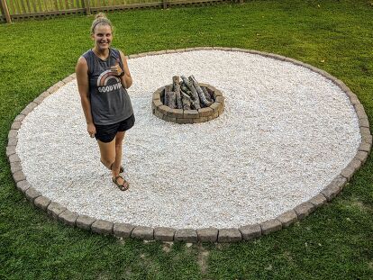 We bought our house almost 6 years ago and let’s just say, the backyard needed some love. There were some overgrown flower beds and a pretty sad excuse for a fire pit that the previous owners had left behind. We moved into our house in the fall and by early spring, we had already replaced the sad, dilapidated looking brick circle “fire pit” for a much nicer kit that we found at Lowe’s. I wish I could say that once we upgraded the fire pit ring and the stones that we used it all… Fire Pit With Gravel, Sand Fire Pits, Backyard Firepit Area, Outdoor Fire Pit Area, Fire Pit Seating Area, Fire Pit Landscaping, Fire Pit Ring, Simple Garden, Backyard Oasis Ideas