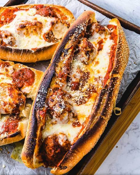 If you live in New York you call it a meatball parm hero. In other parts of the country it's a meatball sub, grinder or hoagie. I just call it delicious! There is simply nothing better than Italian meatballs in sauce with melted mozzarella and parmesan cheese on crusty Italian bread. #meatballhero #meatballsub #meatballparm #meatballparmigiana #meatballparmesan Meatball Parmigiana, Meatball Hero, Meatballs In Sauce, Crusty Italian Bread, Meatball Parm, Homemade Italian Meatballs, Sip And Feast, Parmesan Meatballs, Meatball Sauce