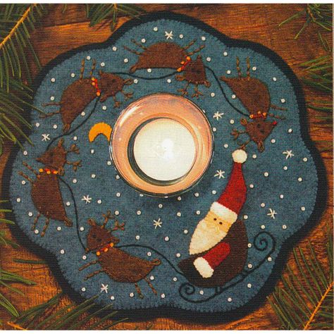 Make this cheer-filled festive candle mat with wool felts and embroidery stitches in this charming project from Barri Sue Gaudet for Bareroots Patterns. Candle Mat finishes to approximately 9" in diameter. This Kit Includes: All Wool Felt Needed to make the Candle Mat Embroidery Floss Please Note: The pattern is NOT included, but is available in the options below! Products Used: Wafer 1 Lightbox 9" x 12½" - Extremely helpful for tracing appliqué shapes CutRite Heavy Duty Freezer Pa Candle Mats Patterns, Wool Applique Kits, Candle Mats, Sweet Candles, Santa And His Reindeer, Wool Applique Patterns, Candle Wrap, Penny Rug, Applique Kit