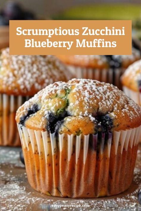 Close-up of a zucchini blueberry muffin topped with powdered sugar. Zucchini Blueberry Muffins, Zucchini Mini Muffins, Blueberry Zucchini Muffins, Quick Muffins, Blueberry Zucchini, Chocolate Chip Mug Cake, Blueberry Muffins Recipe, Easy Zucchini Recipes, Summer Zucchini