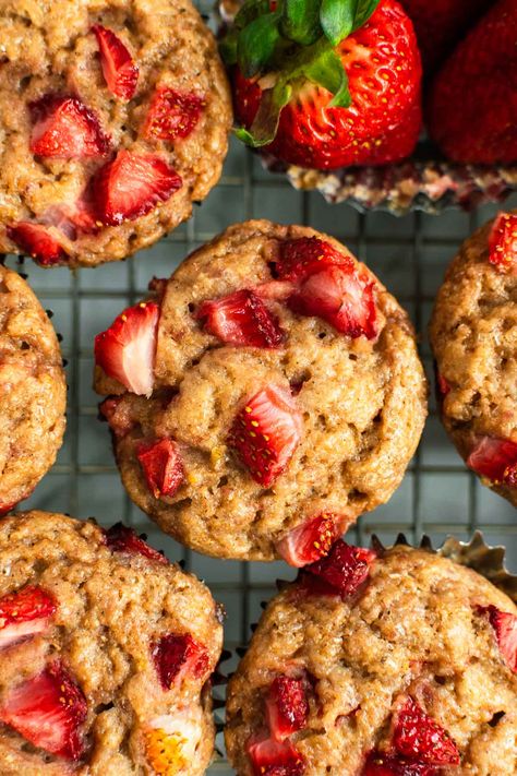 These Greek yogurt strawberry muffins are light, fluffy, and full of strawberry flavor. Thanks to the addition of a reduced strawberry puree AND diced strawberries, these muffins are fully saturated with delicious sweet strawberry goodness. #strawberrymuffins #muffins #muffinrecipe #fruitmuffins #berrymuffins #strawberrymuffin #muffinrecipes #breakfastrecipe #breakfastbaking Greek Yogurt Strawberry Muffins, Healthy Strawberry Muffins, Strawberry Yogurt Muffins, Strawberry Muffins Healthy, Choc Muffins, Fresh Strawberry Muffins, Cottage Cheese Muffins, Greek Yogurt Muffins, Fruit Muffins