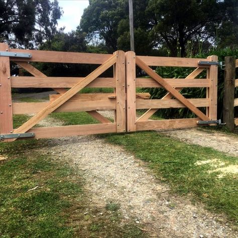 Two Timber Gates with cross braces and custom sliding lock through the middle Wooden Farm Gates, Farm Fence Gate, Farm Fences, Wood Fence Gates, Ranch Gates, House Fence, Timber Gates, Farm Gate, Cheap Backyard