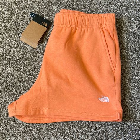 High Waisted The North Face Sweat Shorts In Light Orange. Comfy And Cute For Everyday Wear North Face Sweat Shorts, Cute Sweat Shorts, Sweatshorts Outfits, Preppy Clothes Aesthetic, Cute Comfy Shorts, Short Orange Dress, Sweat Shorts Women, Orange Bottoms, Orange Outfits