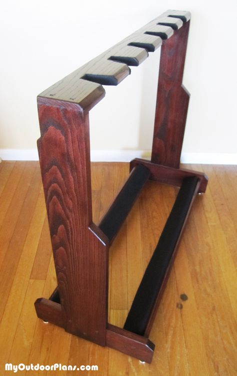 multi-guitar-stand Multi Guitar Stand, Multiple Guitar Stand, Diy Guitar Stand, Wood Guitar Stand, Wooden Guitar Stand, Garden Bench Plans, Guitar Storage, Wine Rack Plans, Guitar Rack