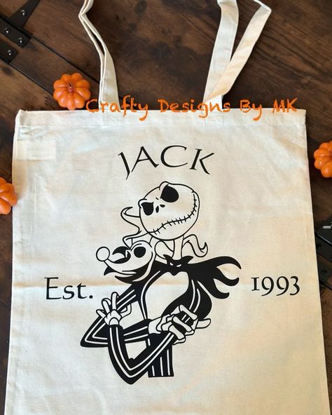 Halloween Tote Bag, Jack Skellington Disney Tote Bag. Available now on our Etsy Shop, link in Bio. Celebrate Halloween in Style These Cute Tote Bags are a great addition to your Halloween costume and parties. Perfect for memorable family photos and trick-or-treating, these quality totes will get everyone into the Halloween spirit. 👻 High-Quality Material Our tote bags are made from 100% cotton, featuring sturdy handles and a gusset bottom to support heavy loads. 🎃Our Custom Halloween Tot... Disney Tote Bag, Disney Tote Bags, Disney Tote, Sublimacion Ideas, Diy Tote, Totes Bag, Halloween Tote Bag, Halloween Tote, Diy Tote Bag