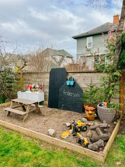 Nature play area with chalkboard, mud kitchen, construction zone and Dino habitat Mud Kitchen Diy, Nature Play Area, Kids Garden Play, Sensory Gardens, Toddler Garden, Backyard Play Spaces, Mud Kitchen For Kids, Outdoor Kids Play Area, Outdoor Play Space