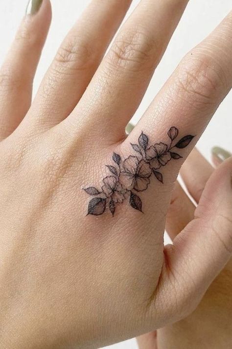 70+ unique and striking finger tattoo designs: symbols, hennas, roses, snakes, dots, lettering, hearts, and wedding rings for couples. Bonus: tattoo meanings. Flower Finger Tattoos, Rad Tattoos, Finger Tattoo Ideas, Thumb Tattoos, Small Finger Tattoos, Tato Henna, Finger Tattoo For Women, Hand And Finger Tattoos, Ring Finger Tattoos