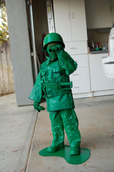 This toy army man costume involves LOTS of green spray paint. Get the tutorial at Wild Ink Press via Redbook. Related: 10 Cute Pet Halloween Costumes   - CountryLiving.com Army Men Costume, Diy Costumes Kids Boys, Creative Halloween Costumes Diy, Meme Costume, Toy Story Costumes, Kids Costumes Girls, Diy Costumes Kids, Diy Halloween Costumes For Kids, Homemade Halloween Costumes