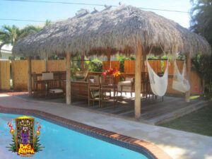 Our Portfolio - Big Kahuna Tiki Huts Tiki Hut Pool House, Tiki Hut Decor, Tiki Hut Backyard, Backyard Tiki Bar Ideas, Wiki Tiki, Tiki Bar Stools, Patio Extension, Outdoor Tiki Bar, Big Kahuna