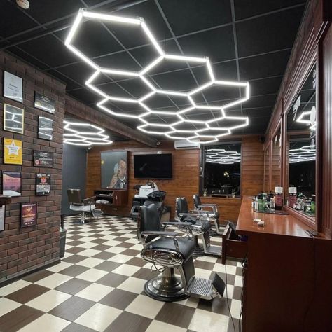 💡 Barbershop Glow-Up 💡 Check out how our Hexagon LED lights are transforming this Barbershop! If you’re looking to upgrade your space, this is how you do it! 🚀 #HomeImprovement #StudioLighting #showroom #GarageUpgrade #StudioUpgrade #SpaceTransformation #HexagonLights #LEDLighting #Garage #garageideas #GarageLighting #ModernDesign #garage #luxurygarage #garagegym #garagebuilt #dreamgarage #barbershop Luxury Garage, Garage Lighting, Garage Gym, Studio Lighting, Dream Garage, Barber Shop, Glow Up?, Showroom, Do It