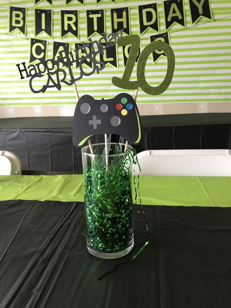 Birthday centerpiece for gamers Gamer Party Centerpiece, Video Game Centerpieces, Video Game Centerpiece Ideas, Gamer Centerpieces, Xbox Birthday Party, Playstation Party, Xbox Party, Video Game Party Decorations, Gaming Birthday