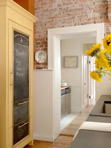 brooksBerry Inspirations- exposed brick, bead board and awesome custom refrigerator front! Apartment Wall Decorating, Wood Shelves Kitchen, Chalkboard Walls, Custom Refrigerator, Trendy Kitchen Backsplash, Apartment Kitchen Ideas, Trendy Apartment, Kitchen Updates, Bead Board