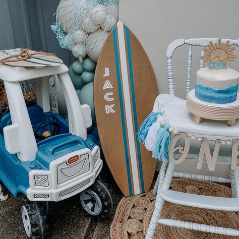 The Big One 1st Birthday party today 🌊🏄🏼‍♂️🌞✨ Smash cake and cookies by Bake Someone Happy. 😋 Little Tikes car makeover and custom surfboards by my brother and Krupted Rides 🏄🏼‍♂️😎✨ The Big One Surf Birthday Centerpieces, Tikes Car Makeover, Little Tikes Car Makeover, The Big One Birthday Party, The Big One Surf Birthday, Beach Bday, Car Makeover, Surf Birthday Party, Surf Birthday