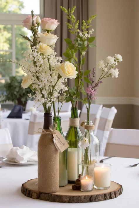 Are you looking to make your wedding reception truly memorable? Check out these 19 stunning round table wedding decor ideas that will impress your guests! From beautiful mismatched bottles of blooms for a rustic charm to elegant floral arrangements that enhance your color scheme, there’s something for every style. Elevate your table set-up with personalized centerpieces, dreamy table linens, and creative lighting. Bring your vision to life with these inspiring designs and ensure your celebration is as beautiful as your love story! Round Table Wedding Decor, Round Table Centerpieces Wedding, Round Table Wedding, Round Table Centerpieces, Table Wedding Decor, Wedding Tent Decorations, Wedding Cheesecake, Round Wedding Tables, Reception Table Centerpieces