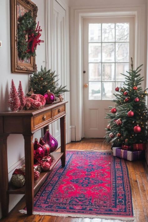 Make a bold statement with colorful ornaments and festive rugs in your Christmas apartment decor entryway. Tap here for more tips! Christmas Decor Styles, Eclectic Christmas Decor, Christmas Apartment Decor, Christmas Hallway, Eclectic Christmas, Monochrome Living Room, Holiday Dining Room, Purple Living Room, Holiday Rugs