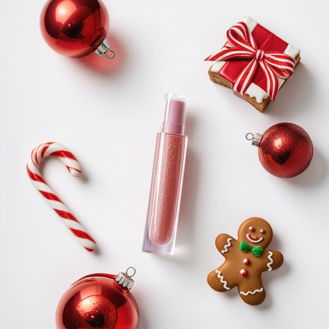 AI cosmetics Photography, A glistening lip gloss tube is surrounded by vibrant Christmas ornaments, a twisted candy cane, and a delightful gingerbread man cookie. This photo captures the essence of holiday beauty essentials, serving as inspiration for simplistic yet vivid product photography.