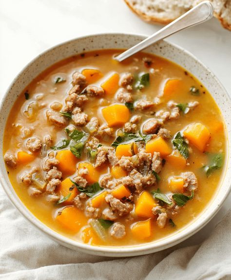 Hearty sausage and sweet potato soup, perfect for a cozy meal. Easy recipe with rich flavors and nutritious ingredients. Sweet Potato Sausage Soup, Soups With Sweet Potatoes, Sausage And Sweet Potato Recipes, Sausage Sweet Potato Soup, Sausage And Sweet Potato Soup, Sausage Sweet Potato Recipes, Sausage And Sweet Potato, Sausage Sweet Potato, Crock Pot Sweet Potatoes