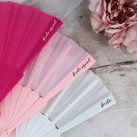 👰‍♀️🌸💕 Beat the heat in style with our vibrant Bride Squad Fans! Whether your hen party is hitting tropical shores or a city hotspot, these pink and white fan favours are the perfect accessory for your bridal entourage. The bride glows in chic white, while her bride squad pops in playful shades of bright or light pink. Not just practical for staying cool, they make fabulous photo props and cherished keepsakes. Elevate your hen do abroad with a breeze of colour and a dash of fun! 🎉💨 #BrideSqu... Australian Hens Party, Hen Do Ideas Abroad, Bridal Entourage, Hen Night Ideas, Fan Favors, Hen Party Decorations, White Fan, Red Hen, Hens Night