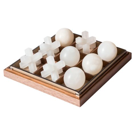 A masterpiece of style and design. Pinetti Tic Tac Toe, our first addition to our board games collection. A canaletto walnut wood box covered with leather and completed with three-dimensional pieces made with the finest Volterra alabaster. A beautiful and sophisticated modern board game that adds flair to any room. Desk Inspiration, Game Collection, Chess Sets, Leather Company, Game Board, Tic Tac Toe, Arte Popular, Tic Tac, Small Decor