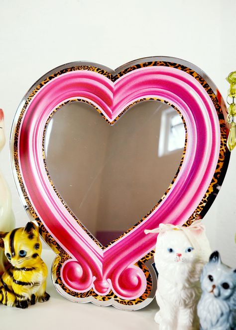 Reflect your playful, kitschy style with the I Heart Me Mirror in 2 sizes! The retro pink frame and leopard print edging add a touch of nostalgia to any space. Perfect for quick touch-ups or to admire your fabulous self. Comes with COMMAND strips for hanging UV printed vinyl & acrylic mirror Small Size: 20cm x 19cm Large Size: 31cm x 29cm Funky Powder Room, Kitschy Style, I Heart Me, Vinyl Acrylic, Kitschy Decor, Retro Mirror, Powder Room Decor, Pink Frame, Mirror House