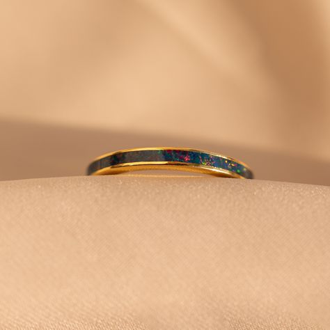 Elevate your style with our Blue Opal Inlay Ring, a vintage-inspired piece featuring a deep blue opal inlay that gracefully encircles the band ♡ This sleek and minimalistic eternity ring not only showcases the unique properties of opal but also offers endless stacking possibilities, making it a versatile and timeless addition to your jewelry collection. Material: High Quality Solid 925 Sterling Silver Finish: 18K Gold Featuring an Indigo Blue CZ Opal Gemstone Inlay on a dainty ~1.5mm band Part o Polymer Clay Rings, Initial Tag Necklace, Polymer Clay Ring, Fingerprint Necklace, Sideways Initial Necklace, Clay Rings, Blue Opal Ring, Diamond Huggies, Stacking Bands