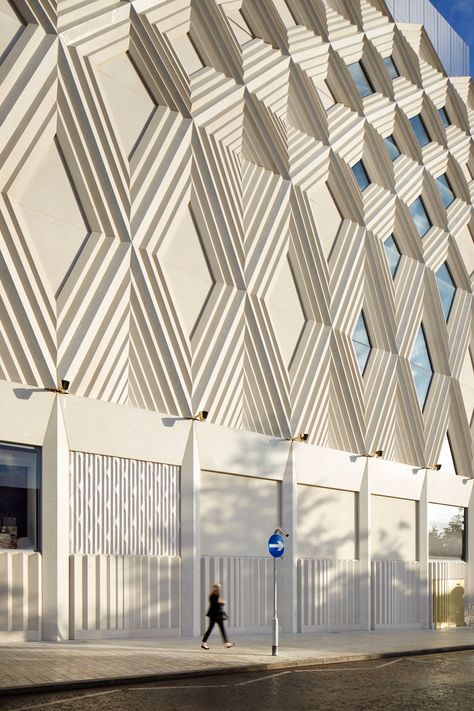 London firm Acme has completed a shopping centre in Leeds, England, featuring a white latticed concrete facade. World Architecture Festival, Best Interior Paint, Retail Architecture, Leeds England, Leeds City, Facade Architecture Design, Concrete Facade, Concrete Finish, Precast Concrete