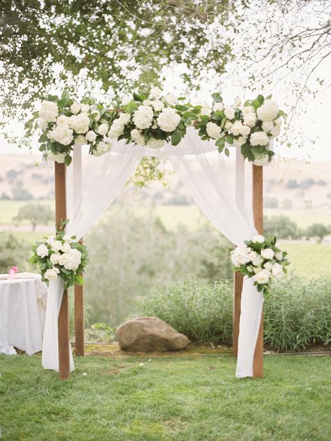 Wedding Arch With White Roses, Green And White Alter Flowers, Hydrangea Wedding Arbor, Stone Tower Winery Wedding, Wedding Alters Diy, White And Green Wedding Arch, Altar Florals, Arbour Flowers, Wedding White Flowers