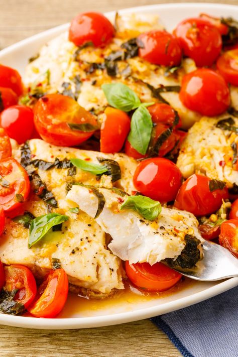 Tomato Basil Cod - Nurtured Homes Cod Tomato Recipe, Cod Dishes, Roast Fish, Cooking For One, Tomato Basil, Tomato Salsa, Minced Garlic, Cherry Tomatoes, My Family