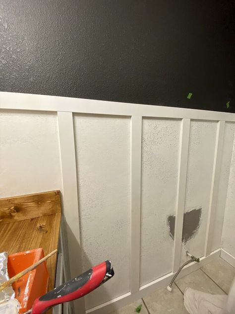 This project is an easy way to install your own "board" and batten. There are no boards, only battens made from inexpensive MDF! Let's get into the steps you need to install your own!   You'll need joint compound and a knockdown knife and, if needed, drywall repair kits. I had two holes to cover. The paint I used for the top part of the walls was Sherwin Williams "Carbonized". Determine how far up the battens are going to go and mark. If you have textured walls, use joint compound to s… Textured Walls Board And Batten, Batton Board On Textured Walls, Board And Batten Wall With Textured Walls, Textured Board And Batten, Covering Up Textured Walls, Board And Batten On Plaster Walls, How To Update Textured Walls, Cover Up Textured Walls, Textured Walls In Bathroom