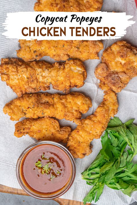 Indulge in the spicy, crunchy goodness of Copycat Popeyes Chicken Tenders. This homemade version captures the unique flavor and texture of the beloved snack. Popeyes Chicken Tenders, Popeyes Chicken Tenders Recipe, Homemade Breaded Chicken Tenders, Copycat Popeyes Chicken Tenders, Popeyes Chicken Recipe, Popeyes Spicy Chicken Tenders Recipe, Copycat Popeyes Spicy Chicken, Chicken Tenders Popeyes, Cereal Chicken Tenders