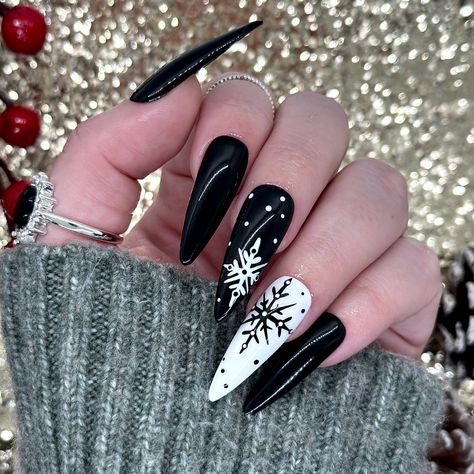 Dawn Witch Designs Unique, re-usable, hand painted, and made in Canada. These luxury press on nails are handmade using high quality gel polish and salon-grade materials.  ✨ MONOCHROME SNOWFLAKES ✨  Delicate snowflakes hand-drawn on a monochrome background. Perfect when you want a little festive in your life without all the garish colours.  *The shape shown in the pictures is the LONG STILETTO *Colours may appear a little different due to your personal monitor settings* ✨ BUY 3 GET 1 PROMOTION ✨ Manicure Christmas Nails, Christmas Nails Winter, Nails Luxury, Christmas Manicure, Long Stiletto, Nails Winter, Nails Christmas, Luxury Nails, Nails Short