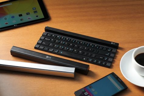 LG Rethinks Design of Roll-Up Keyboard by Going Solid Rather Than Flexible // Portable Keyboard, Keyboard Accessories, Lg Electronics, Bluetooth Keyboard, Cool Tech, Electronic Devices, Blackberry Phone, Logitech, Mobile Accessories