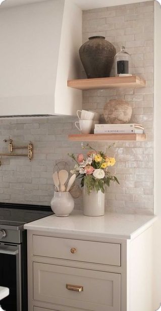 Apartment Kitchen White Cabinets, Timeless Cream Kitchen, Above Cabinet Storage Kitchen, Neutral Bright Kitchen, Small Kitchen Cream Cabinets, All Cream Kitchen, Organic Modern Small Kitchen, Cream Color Cabinets Kitchen, Small Kitchen Backsplash Ideas